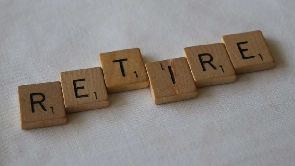 Letter tiles spelling the word retire